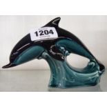 A Poole Pottery dolphin