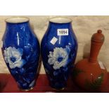 A pair of continental blue and white vases, various factory marks to base - sold with a Watcombe