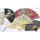 Six vintage fans including black lace, white lace and bone with painted courting scene by O. Garces,