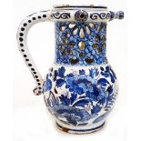 An 18th Century Delft ware puzzle jug