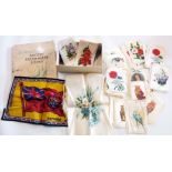 A box containing a small collection of cigarette silks (various subjects) - sold with a part album