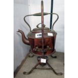 A copper and brass spirit kettle