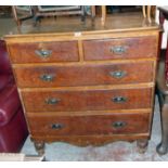 A 3' 6" Victorian stained and grained pine chest of two short and three long graduated drawers,