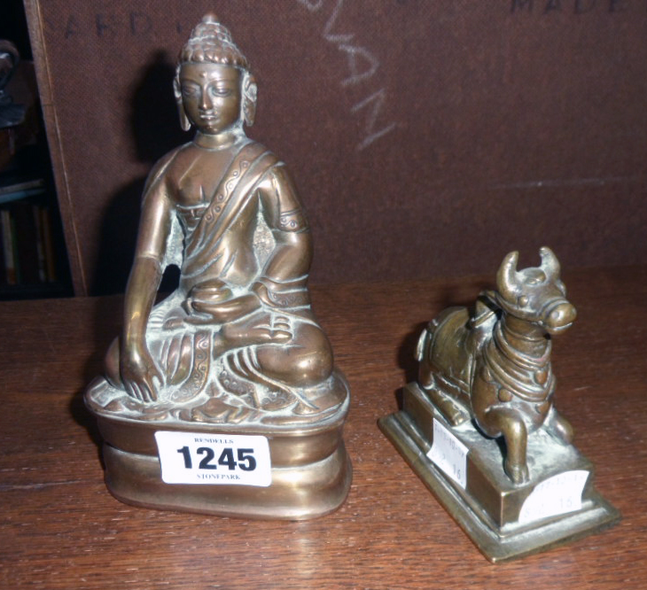 A brass Buddha in lotus position - sold with a solid brass bull set on plinth base - Image 2 of 2