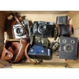 Three vintage cameras comprising box Brownie, Russian Cosmic 35 and Agfa Optima 1