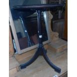 A 17" diameter mahogany pedestal wine table, set on turned pillar and moulded tripod base - repair