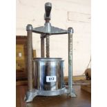 A vintage metal fruit press - a/f