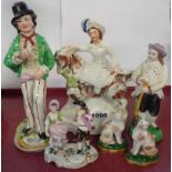 Three Staffordshire figures, cats, etc.