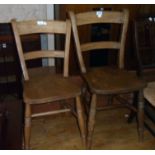 Four similar antique Windsor kitchen chairs, all with solid elm seats and ring turned supports