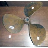 A bronze Columbian brand three-blade boat propeller