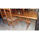 A 6' 20th Century polished pine refectory style dining table with thick solid sectional top, set