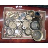 A box containing brassware including balance scales, candlesticks, etc.