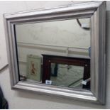 A silvered gilt framed oblong wall mirror with original plate