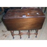 A 21" 1920's mahogany gateleg table, set on slender turned supports with pad feet