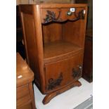 A 17" 20th Century French polished oak bow front pot cupboard with marble top, drawer and cupboard