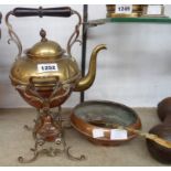 A brass spirit kettle, bowl and souvenir Welsh loving spoon