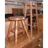 A polished pine stool with circular seat and ring turned supports - sold with a modern domestic