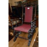 A late 19th Century stained wood framed child's American rocking chair with turned supports and