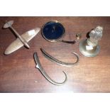 Five pieces of brassware including bell, model Spitfire, etc.