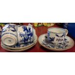Three similar blue and white continental tea cups and saucers