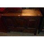 A 3' 11" late 18th Century oak mule chest with internal candle box and slide, triple panel front and