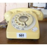 A vintage GPO dial telephone with cream finish