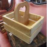 A 14" modern pine basket with heart pierced handle