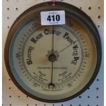 A brass cased bulkhead barometer with aneroid works, the printed dial marked for Develumeter.