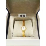 A Longines lady's import marked 750 gold watch with quartz movement, spare links, outer card box and