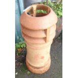 A louvered chimney pot
