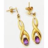 A pair of import marked 375 gold open twist drop ear-rings, each set with an oval amethyst