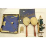 An early 20th Century boxed Table Tennis set with vellum clad battledores marked "Whiff-Whaff", net