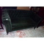 A 5' 8" late Victorian single drop end Chesterfield settee upholstered in button back green