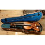 A late 19th Century Strad copy violin with paper label and 1719 date, with unmarked bow and hard