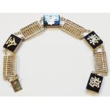 A Hong Kong marked Sterling black onyx and abacus panel link bracelet with character writing