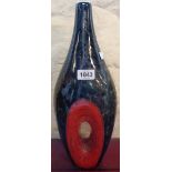 A large ceramic bottle vase