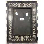 A late 19th Century Italian Renaissance style ivory inlaid picture frame in the manner of