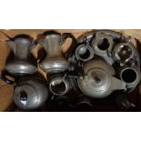 A hammered pewter tea set - sold with other pewterware including coffee pots, jugs, etc.