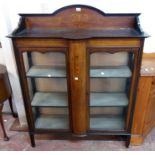 A 3' 9" Edwardian inlaid mahogany and strung display cabinet with low raised back and material lined