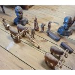 Two African carved hardwood busts and a collection of small carved wood figures and animals