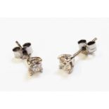 A pair of hallmarked 750 white gold diamond solitaire stud ear-rings - 0.5ct. TDW