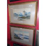 A pair of gilt framed late 19th Century watercolours depicting mountain lake landscape with