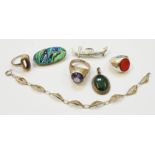 A small quantity of white metal jewellery including three rings, abalone panel brooch and fancy link