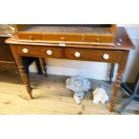 A 3' 6" Victorian mahogany side table with moulded top and two frieze drawers, set on turned legs