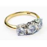A marked 750 yellow metal three stone diamond ring - approx. 3.5 ct. TDW