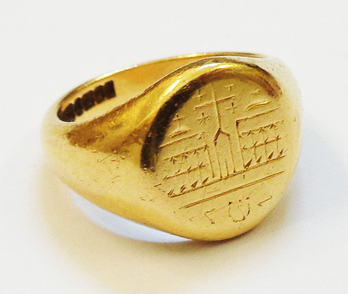 An 18ct. gold signet ring with incised temple decoration