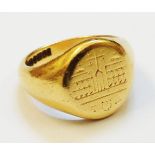 An 18ct. gold signet ring with incised temple decoration