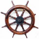 A large old eight spoke ship's wheel with cast nameplate to hub for Tyne Metal Co. Ltd. Hexham-on-