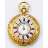 An early 20th Century J. W. Benson ornate marked 18k. yellow metal lady's half hunter fob watch with