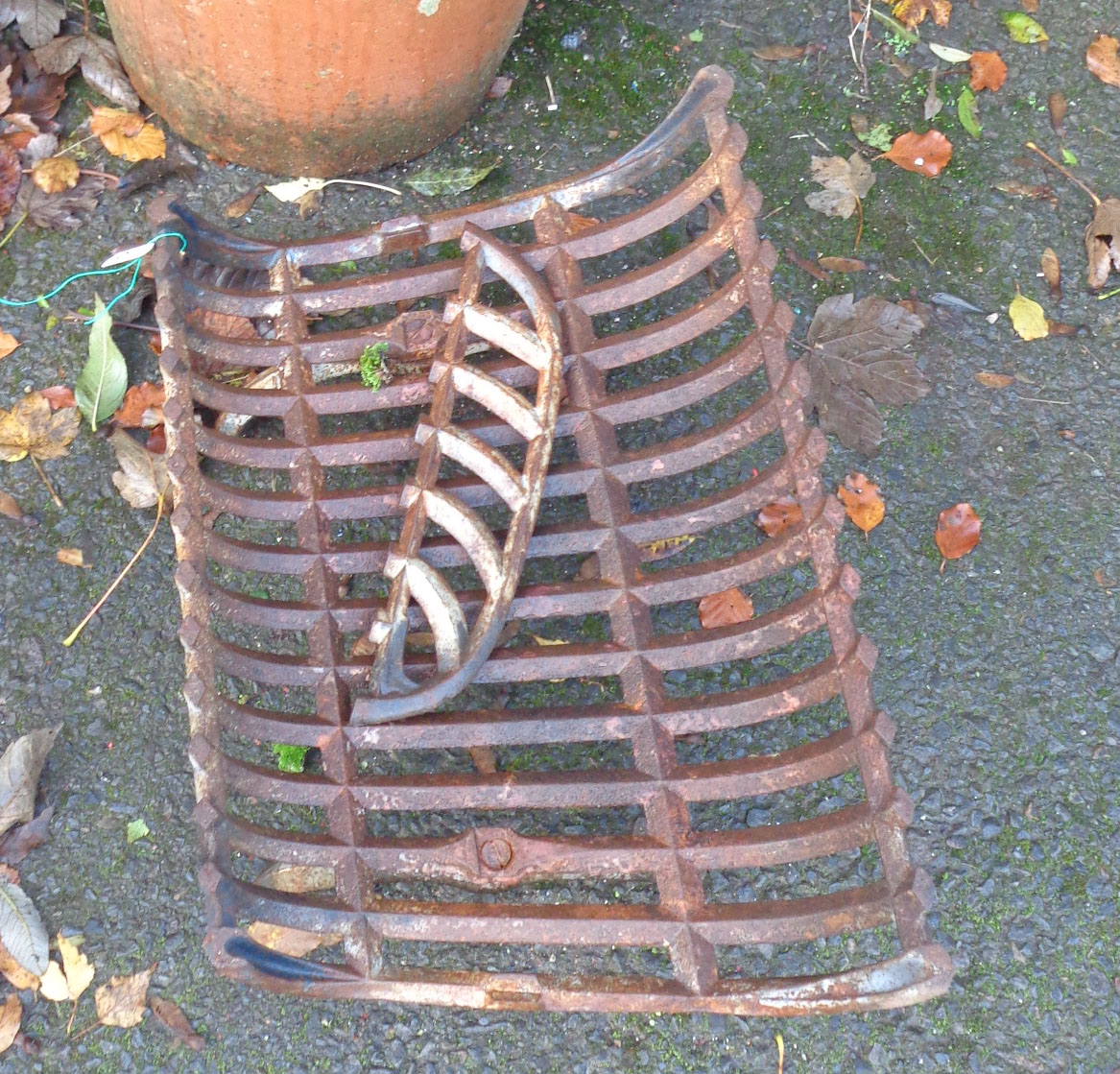 A cast iron fire grate